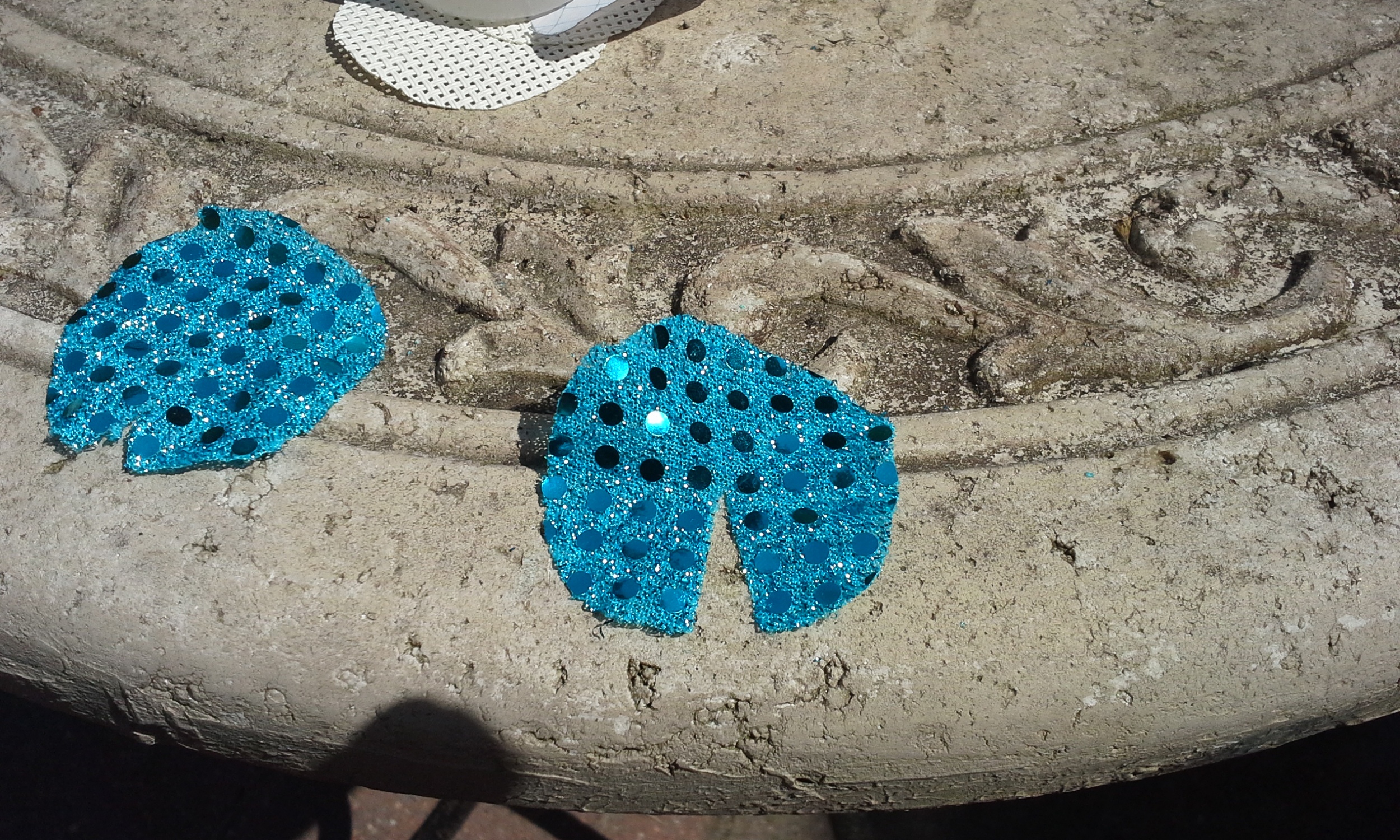 Slit cut to center of each fabric circle