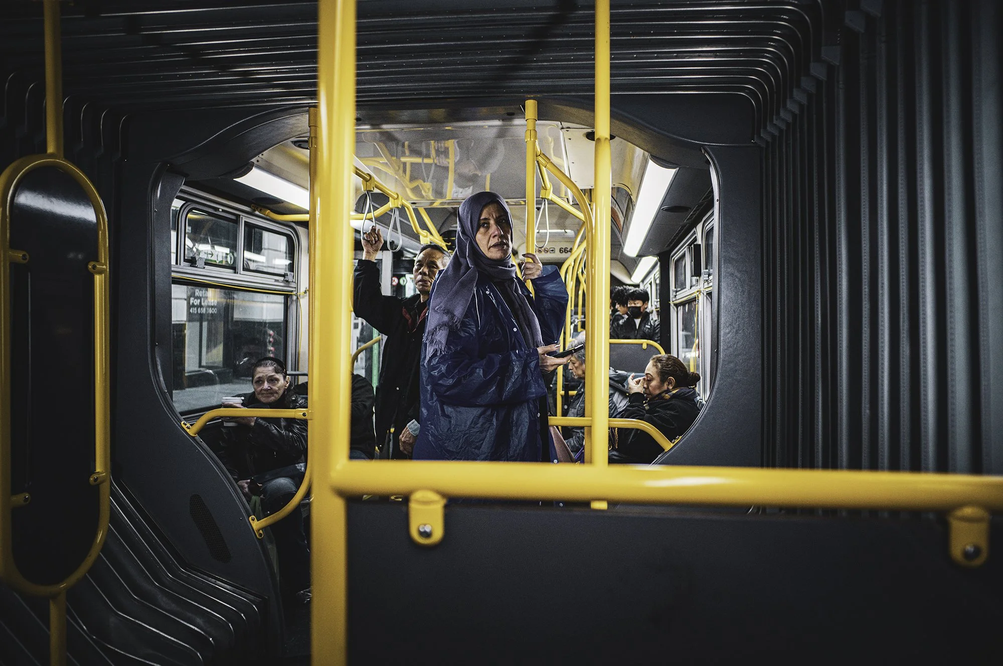 Woman on Bus Muslim L1002518-Edit.jpg