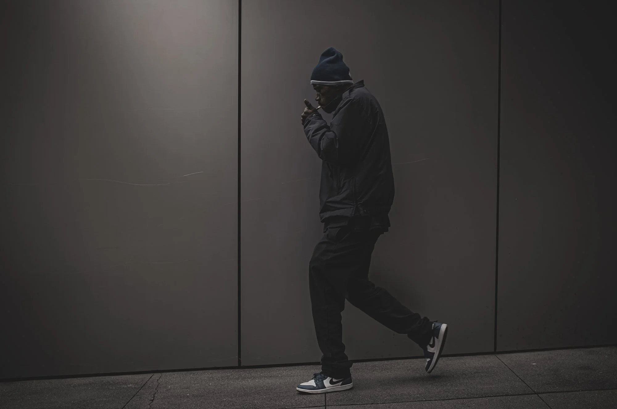 Guy Lighting Smoke Apple Wall L1001768-Edit.jpg
