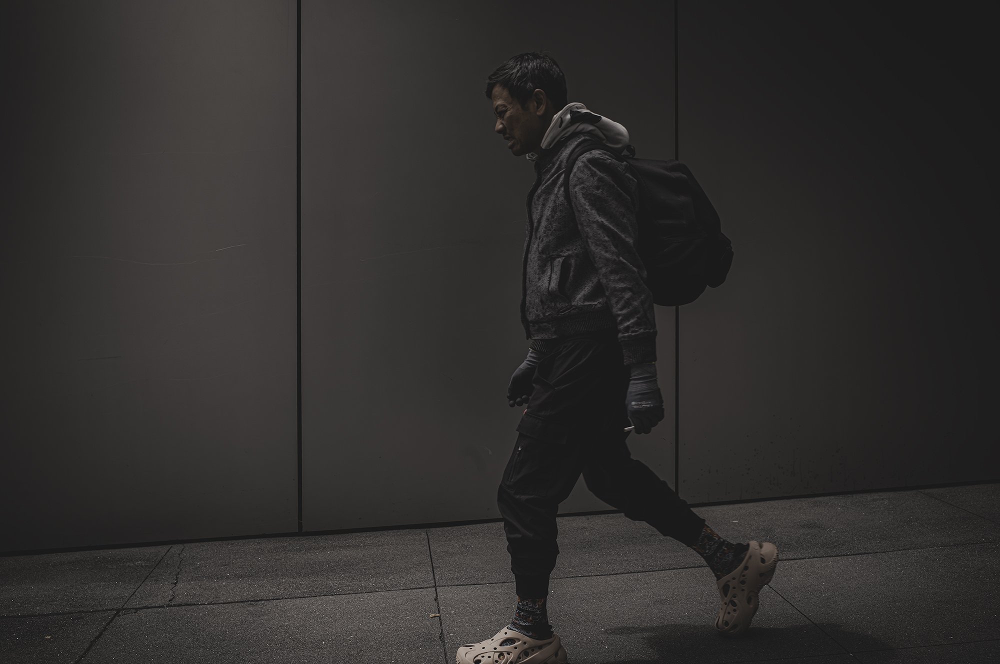 Guy Struggle Backpack Apple Wall L1001695-Edit.jpg