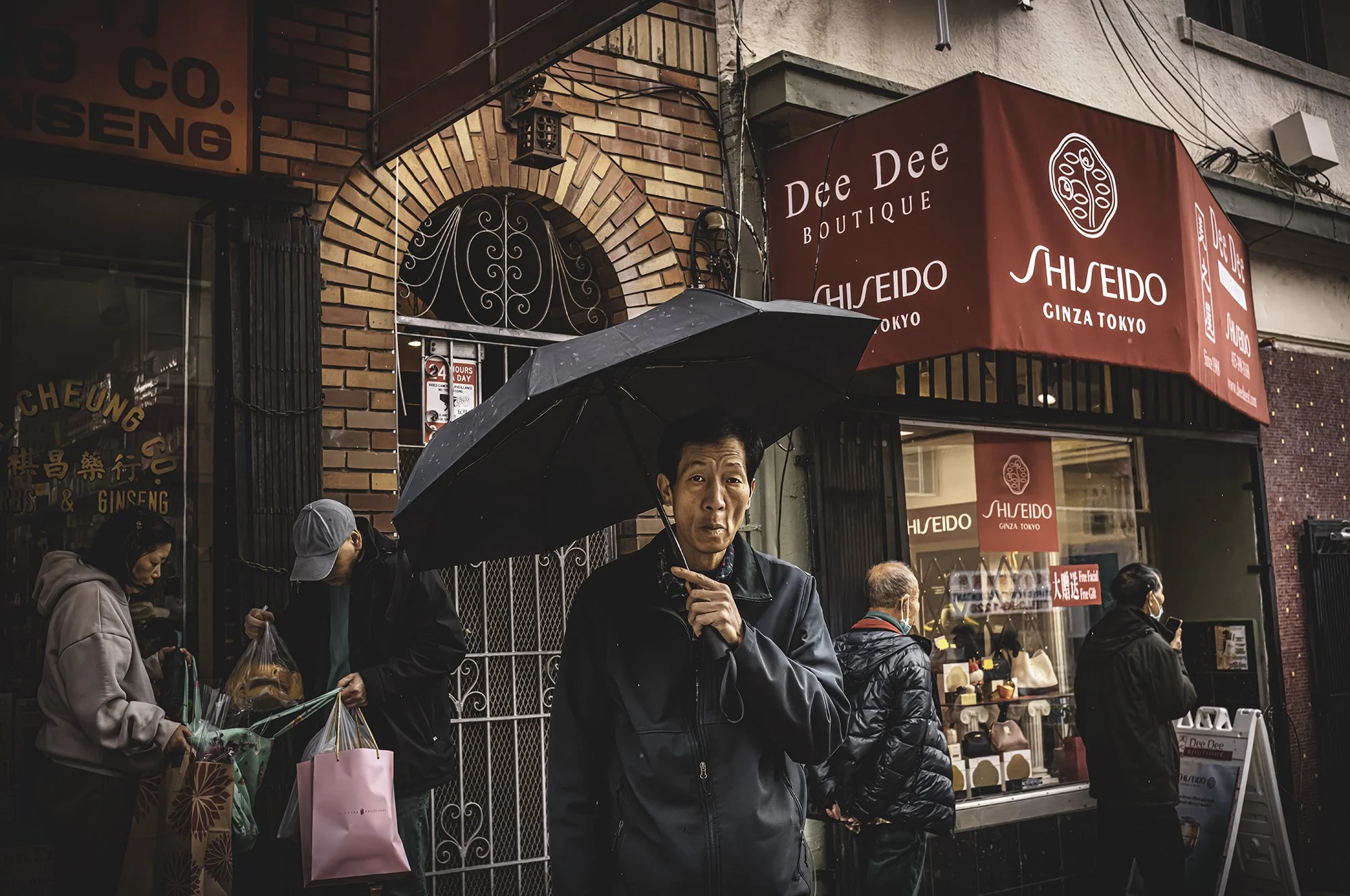 Man on Street v2 UmbrellaL1008507-topaz-rawdenoise-face-Edit.jpg