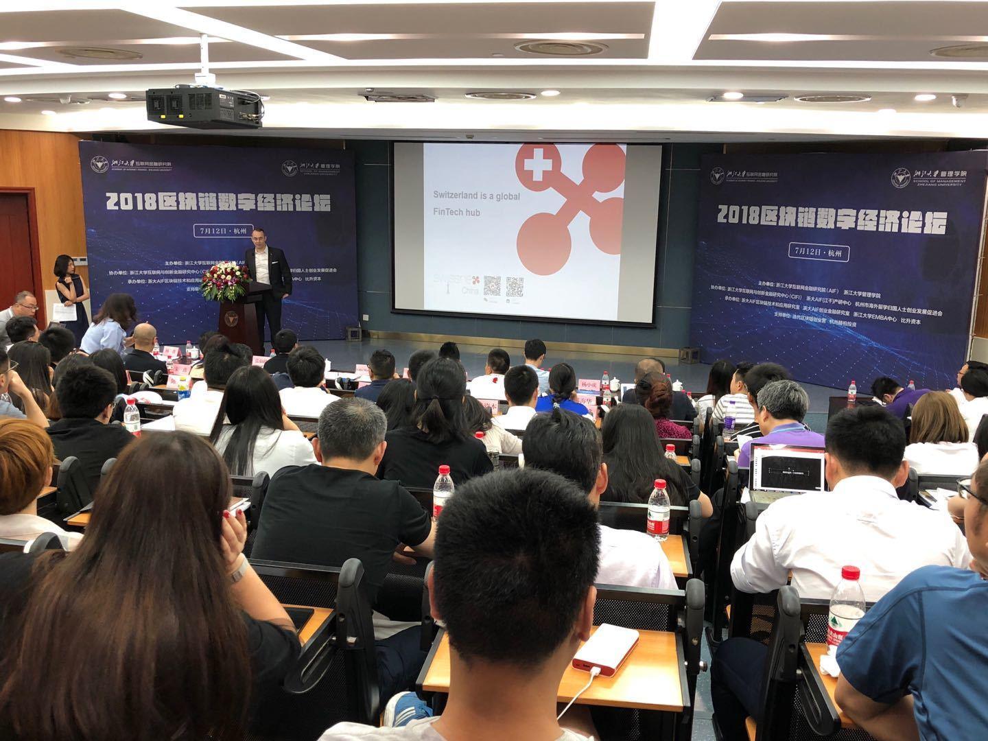 The spacious lecture room was fully packed, with many amongst the audience standing in the back.