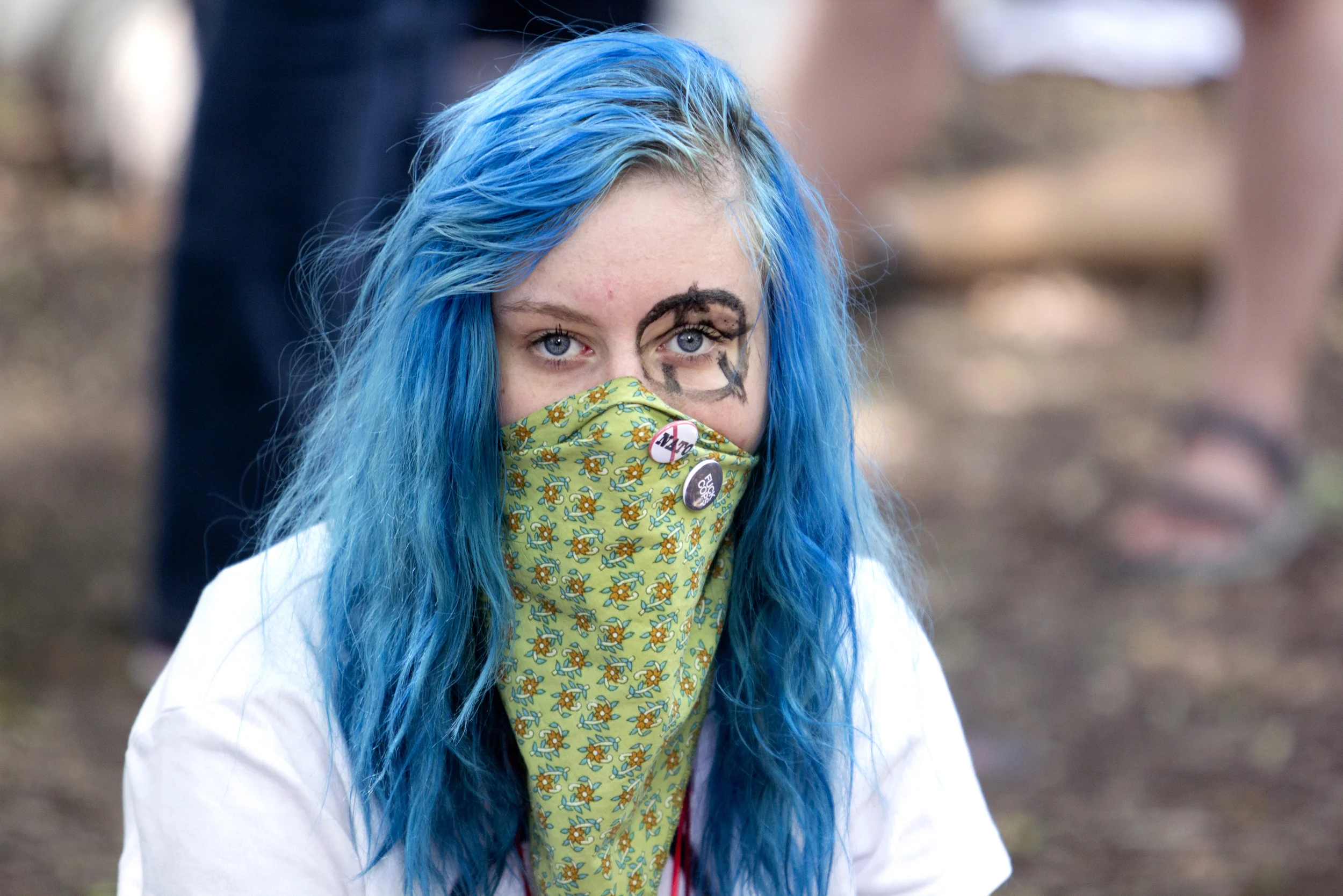 A protestor poses for a portrait at the 2012 NATO summit in Chicago. 