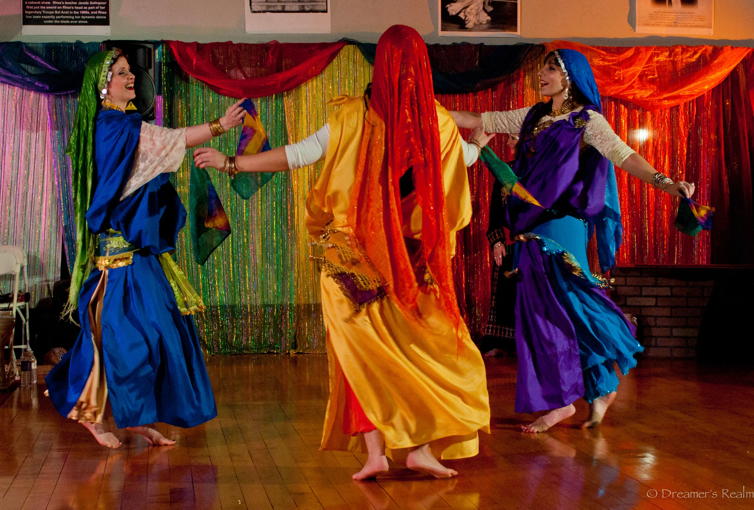 (L - R) Rihanna, Ma'isah, and Angela perform a Tunisian dance. Photo by Dreamer's Realm Photography.