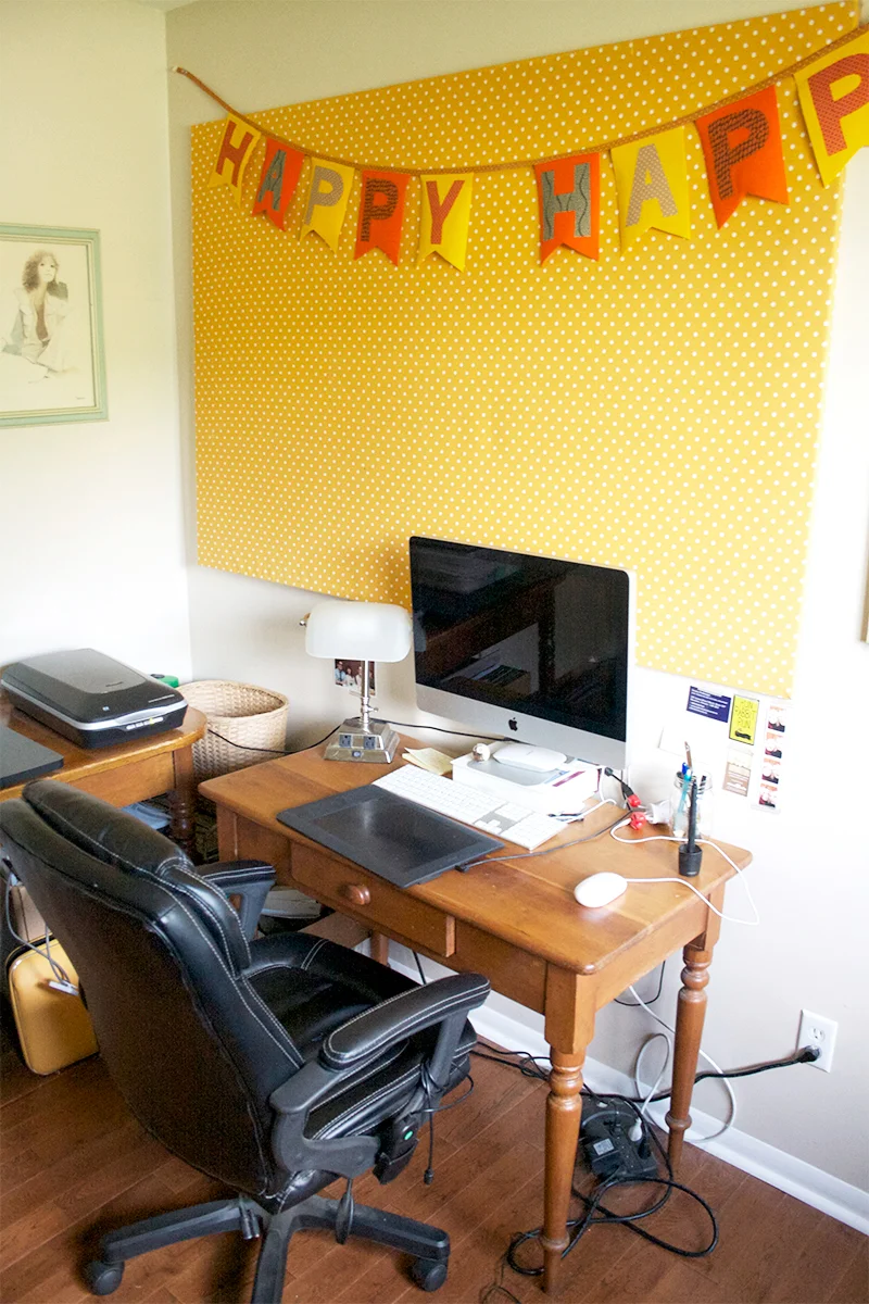 To the left of Finn's bed is my computer desk, and another table with my scanner and copy stand. I made the "Happy Happy" Bunting at a class at Needlework in Hamilton. 