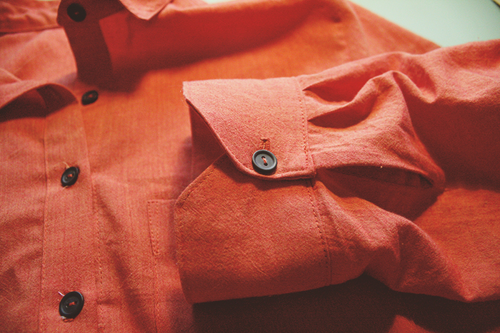 I need to trim my button hole threads... please ignore the explosion of threads behind each button. 
