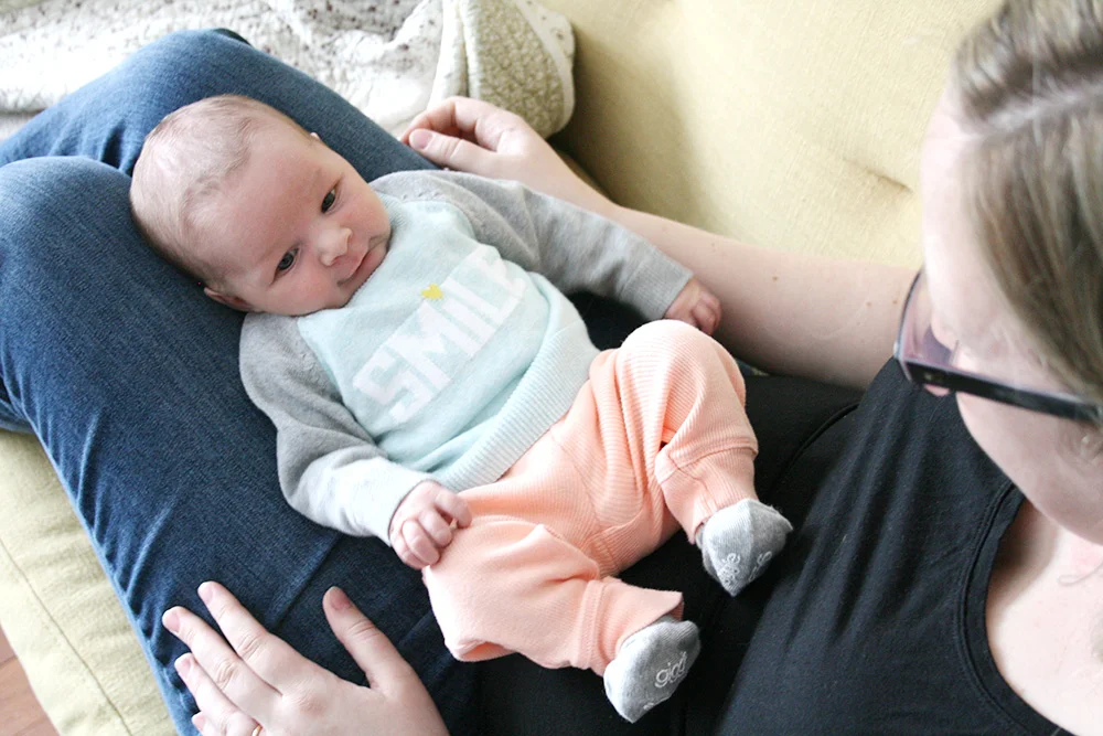 This is my favourite outfit of hers... I bought it the day we found out we were having a girl. Something about tiny sweaters makes my heart go pitty- pat.