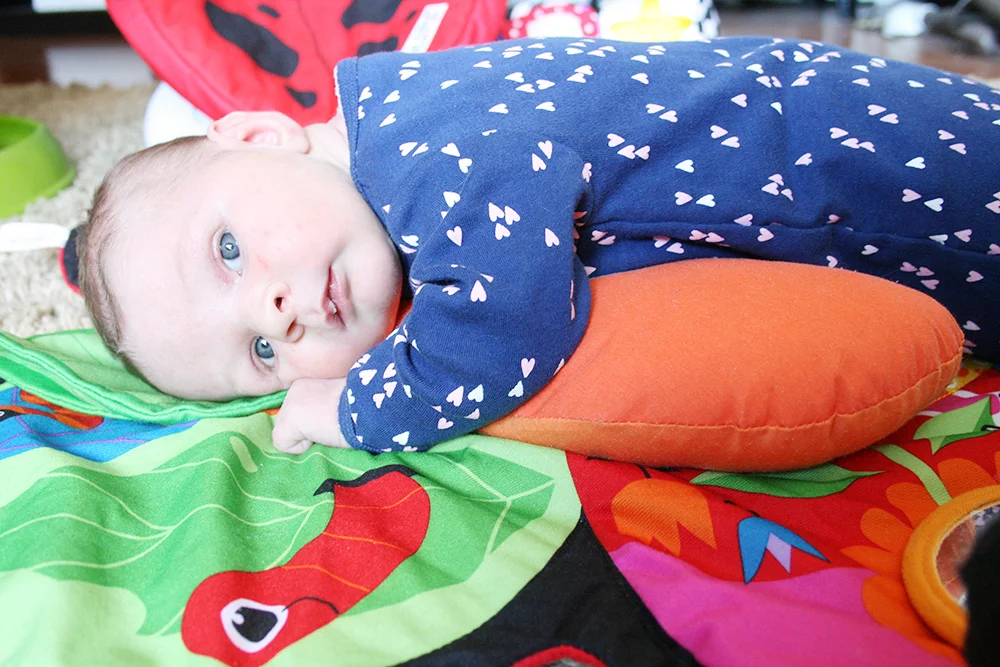 Tummy time... thank god she loves staring out the window or she would be screaming her head off.
