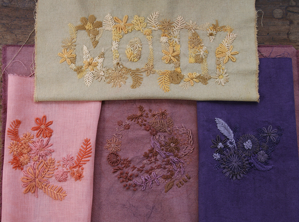 All of the finished embroideries after dyeing, drying and being pressed! 