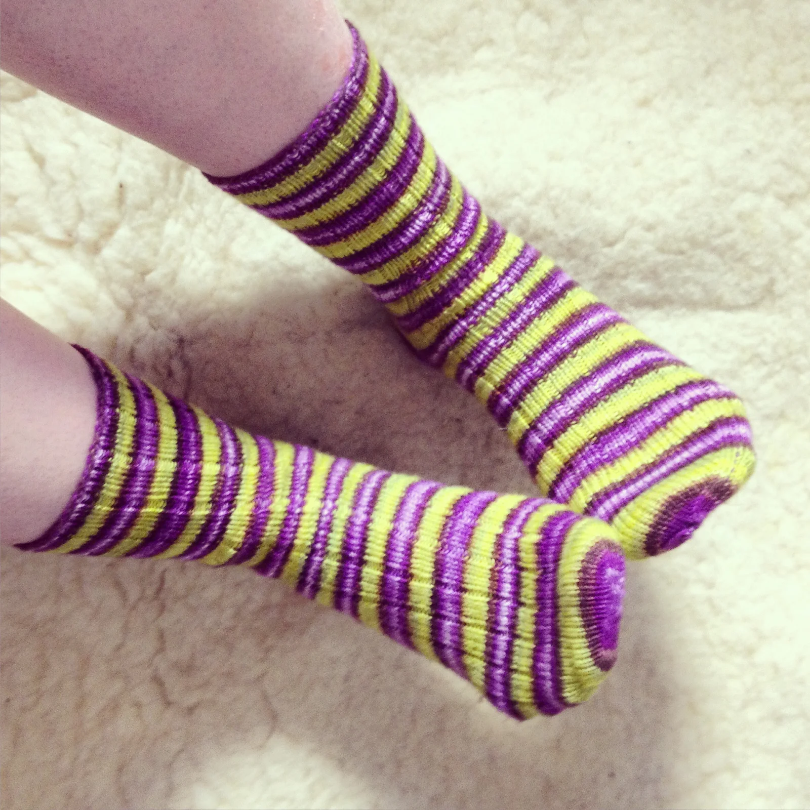Ribbed socks in 'Leaky Cauldron' Self-Striping Yarn by Biscotte Yarns