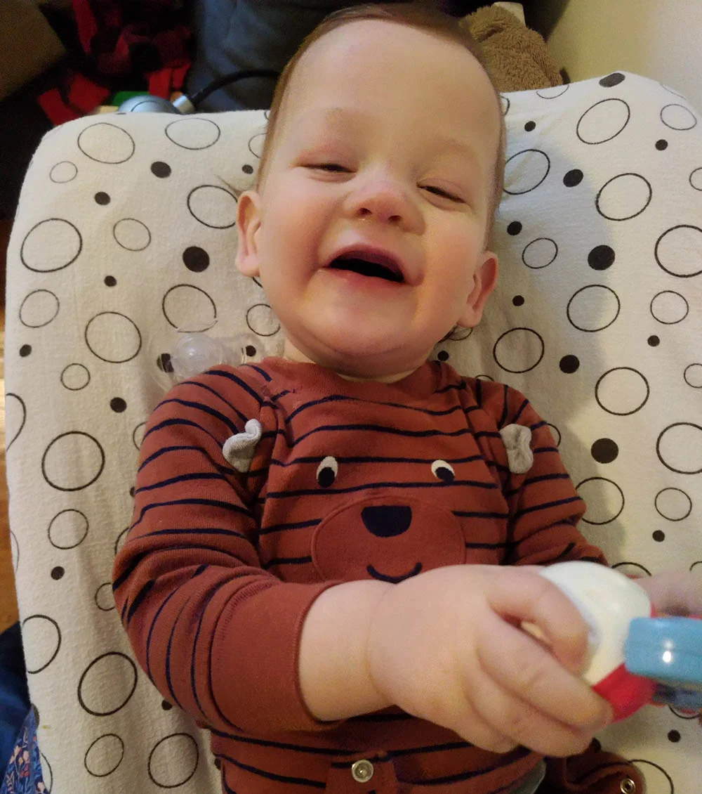 James on the changing table. I always try to make him laugh so he doesn’t mind staying there for a minute.