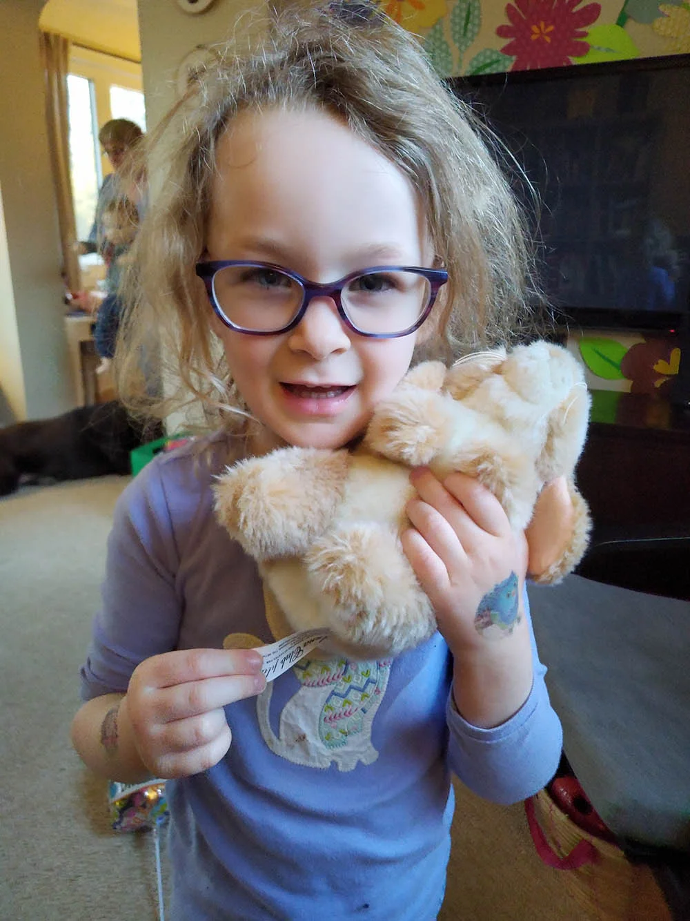 Molly before bed with my mother-in-law/hero in the background with James.