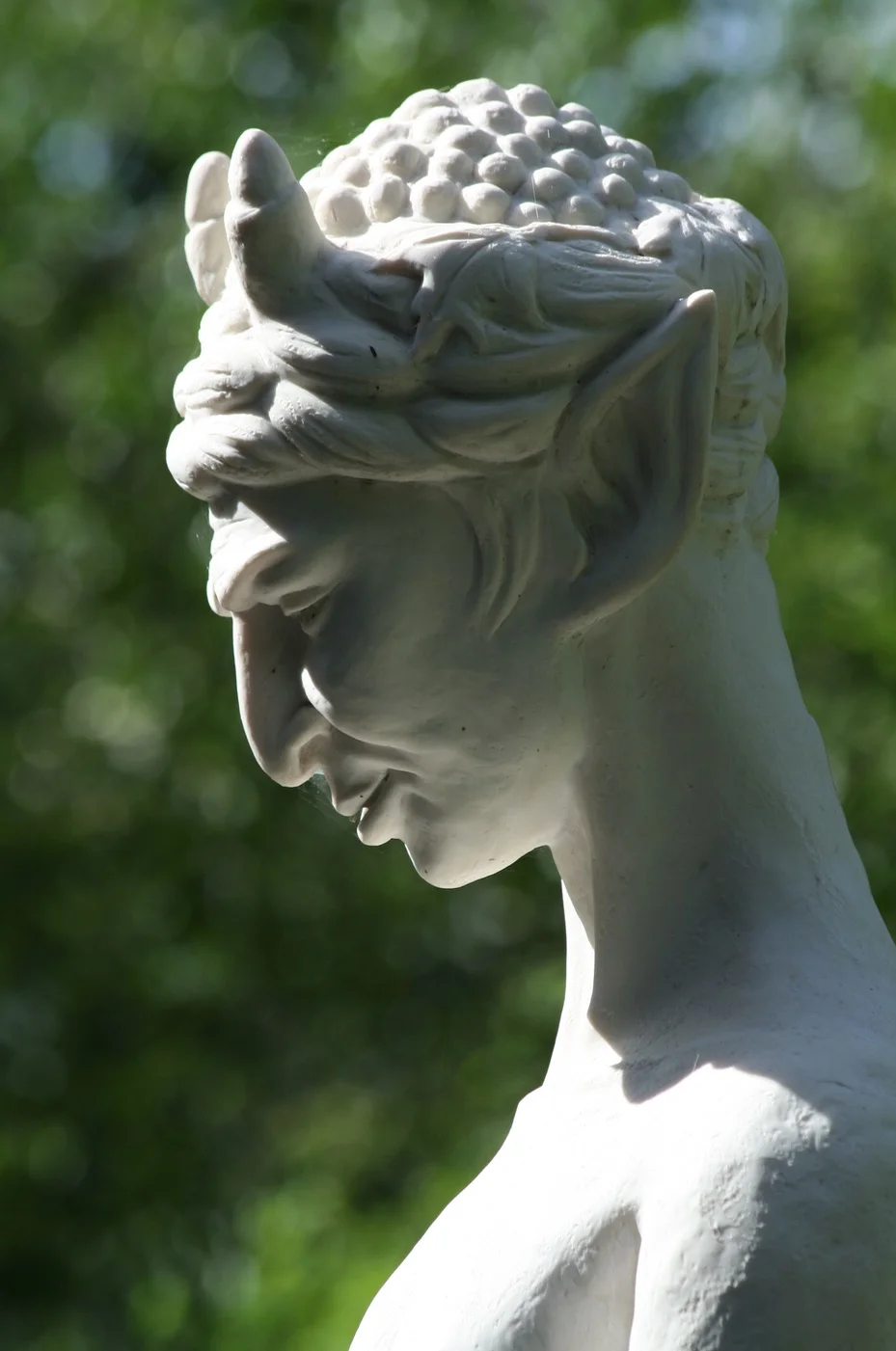 If you live on Saratoga Springs, NY, most of you will recognize this statue in Congress Park, called a ‘herm’ (or satyr, most likely representing Pan, the Greek god of the forest). This is one of four sculptures in what is called the Palladian Circle. I have been photographing these sculptures over several years, but this shot caught the herm—fortunately—in just the right light.. ©2017 Sean Walmsley; 