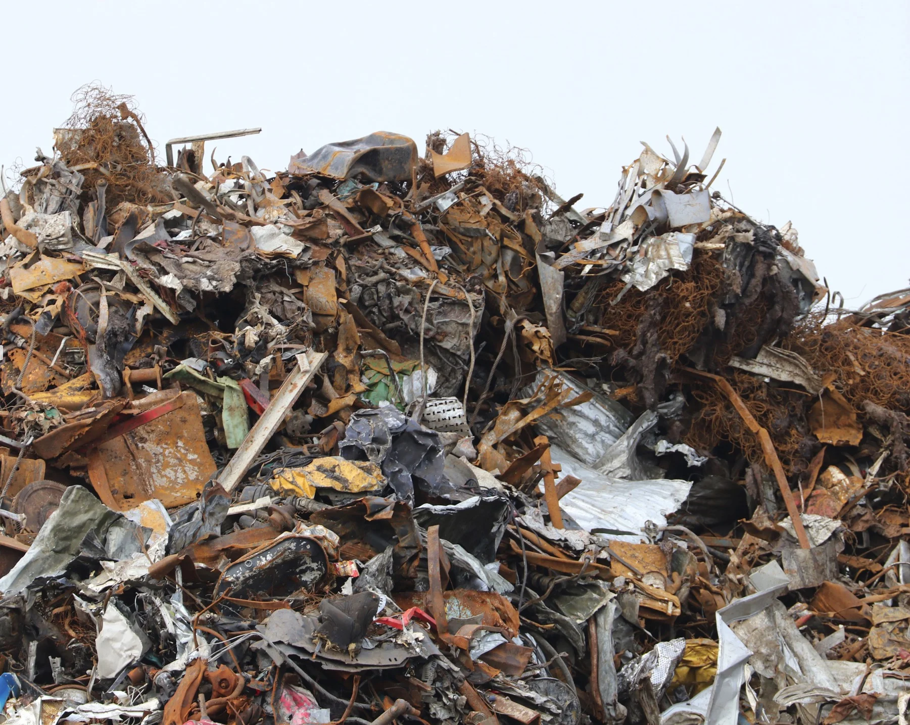 I was fascinated by this pile of metal scraps I found on one of the docks in Galway Harbour (Ireland). One of the advantages of displaying this photo in a small space is that one can look for items to think about what they might have been in the real world. Several mattress or car seat springs here, flywheels, radiators, fans, transmissions, etc. It does remind us how much waste we accumulate—but at least this stuff can be recycled! ©2017 Sean Walmsley; 