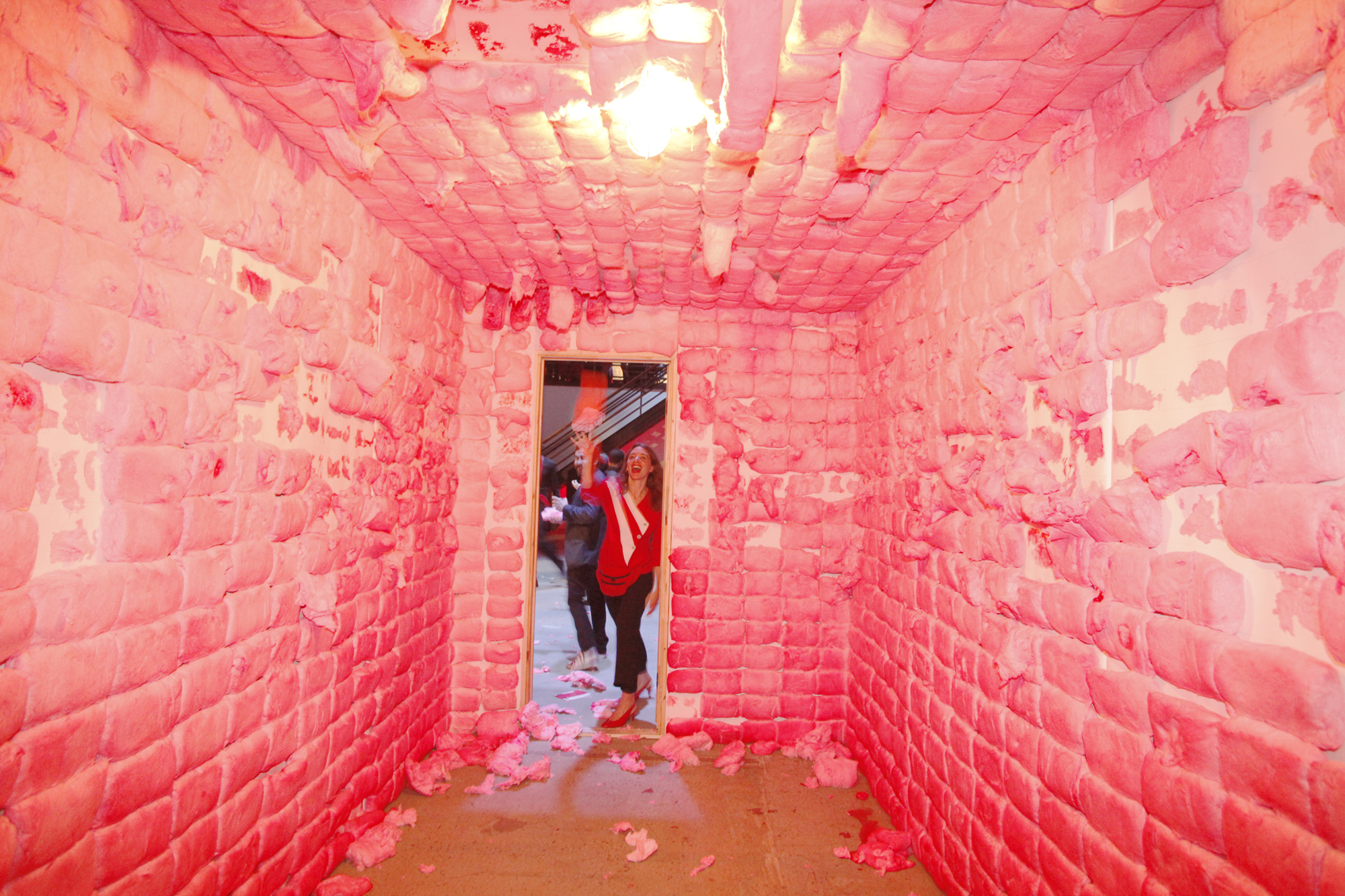 Jennifer Rubell's Padded Cell for Performa's Red Party (2010) Most of the art circuit's current obsession with high-concept food is largely indebted to the comedic genius of food artist Jennifer Rubell . One might imagine, growing up as she did in the household responsible for the Rubell Family Collection , the young Rubell had her fill of lukewarm salmon and has henceforth made a career out of turning up the heat on blue-blooded banquets. Her Pepto-Bismol-colored mental asylum chamber pictured above, built for the performance art nonprofit Performa and its Russian constructivist-themed party, was padded with 1,800 cotton candy bricks, symbolizing something-something about "an all-American funhouse that is at the same time confining, threatening, claustrophobic." The actress Anne Hathaway, however—one of the guests held captive in this chamber of spun insanity—found the experience akin to her memory of a college foam party , in which many of the co-eds contracted pink eye. 