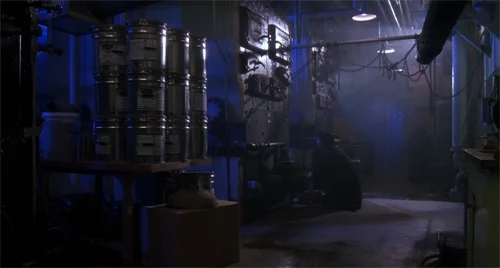 Blue light and keg-like canisters represent Bob Stinson's path of self-destruction. Maybe.