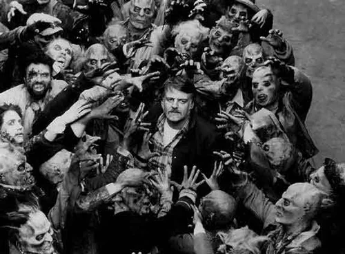 Night Of The Living Dead director/zom-father George Romero with his creations. 