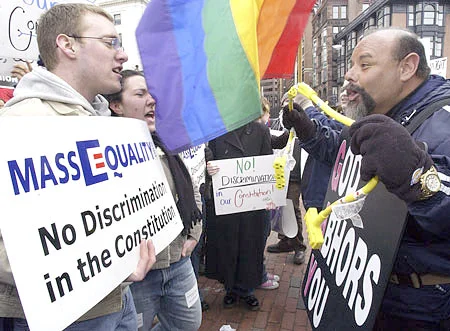 The right guy (standing on the left) won, gay marriage passed in Massachusetts, and it was a huge step for equality not just in Boston, but everywhere. 