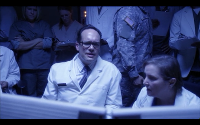 Diedrich Bader as the surgeon behind Buster's monster hand transplant.