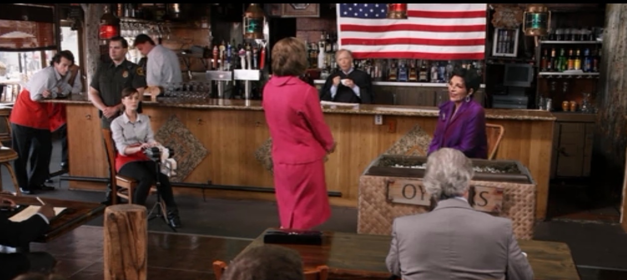 Lucille 1 puts Lucille 2 on the stand--pink vs. plum.