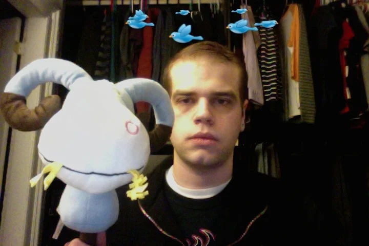 Jacobs_headshot w_ goat.jpeg