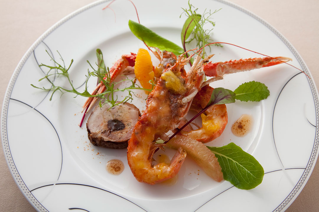 Grilled langoustine and duck pate with citrus hollandaise sauce prepared by Koh Kikuchi