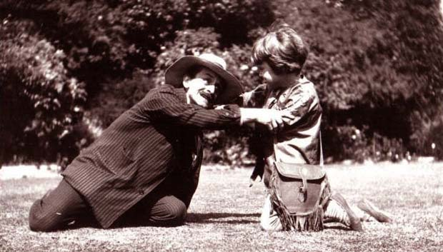 Barrie with Michael Llewelyn Davies dressed as Peter Pan