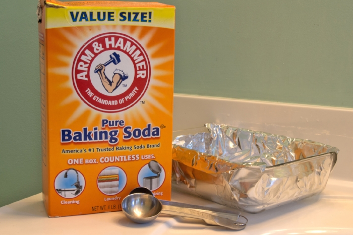 How to clean silver and copper using aluminum foil, baking soda, and hot water.