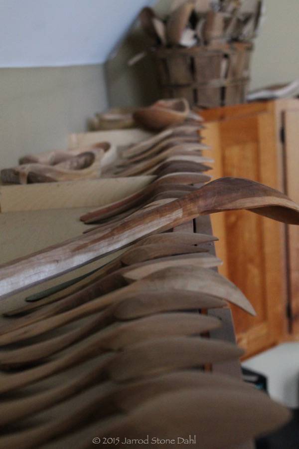 Derek's spoons on one cabinet