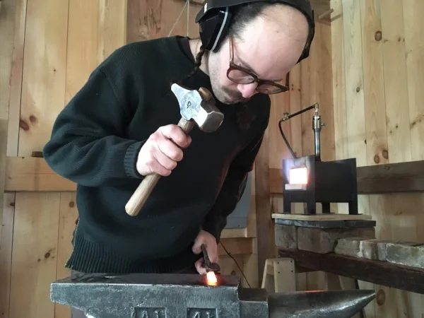 REID WORKS IN HIS NEW SHOP IN NEW HAMPSHIRE