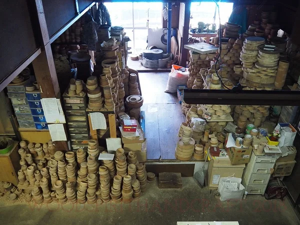 Takehito's woodturing workshop with all the bowl blanks waiting to be turned.