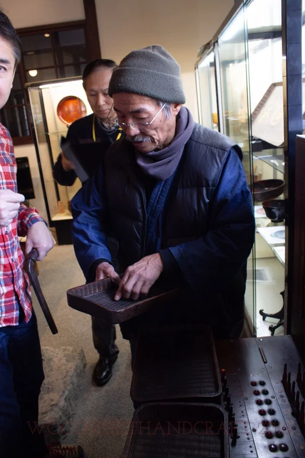 Shinichi and an antique tray.
