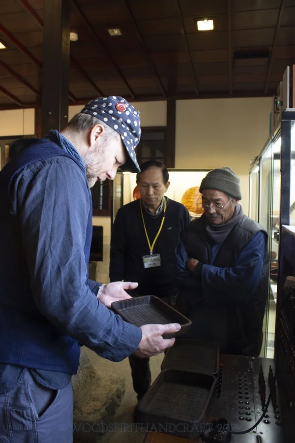 Shinichi-san showing me a few antique trays at a small museum in Yamanaka-onsen.