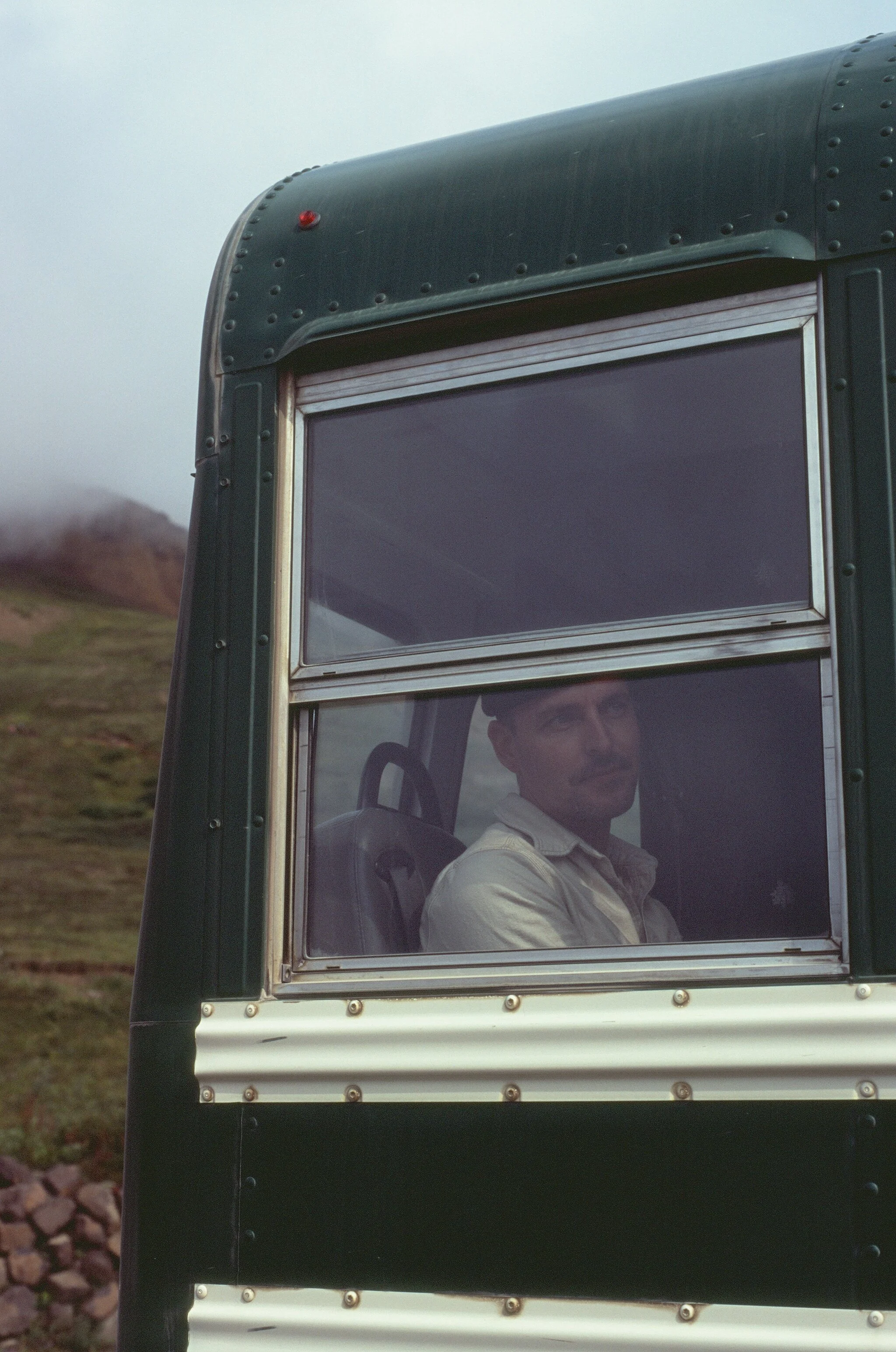 jay on a green bus in denali.jpg