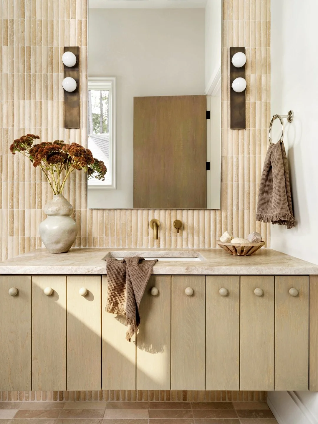 At Ryan Cottage, every design choice was made to bring the beauty of Lake Oconee right into the heart of this family&rsquo;s retreat. With a full wall of windows anchoring the kitchen, the entire main level feels connected to the water and the lush g