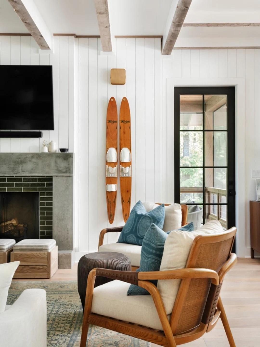At our Kennebec project on Lake Martin, we layered a transitional, modern design that feels both elevated and effortless. 

Clean architectural lines in the lighting and shelving create a crisp foundation, while thoughtful pops of color in paint and 