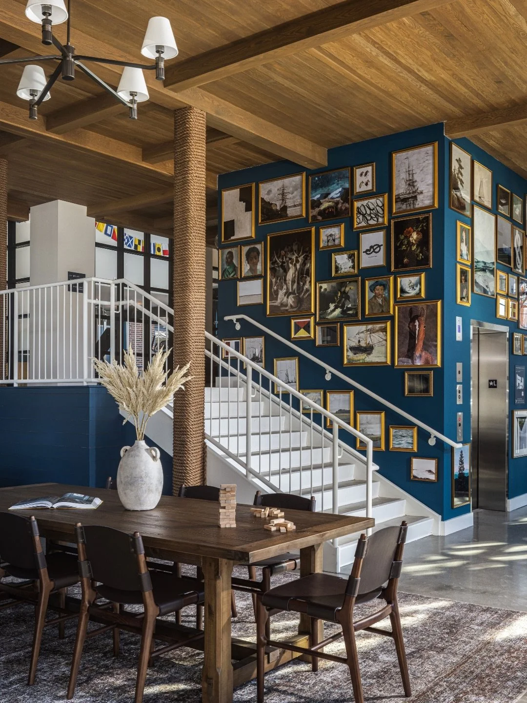 A gallery wall should feel collected, not crowded.

We approach each one with intention&mdash;balancing scale, proportion, and negative space before a single nail goes into the wall. Start with a strong anchor piece to ground the arrangement, then la