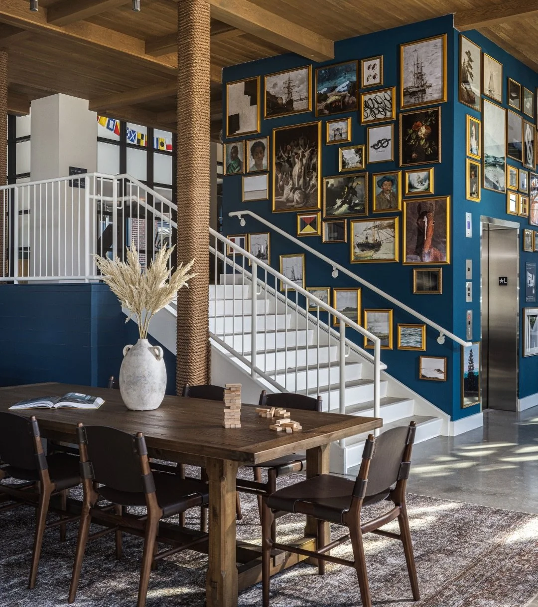 At The Commodore, every common space was imagined as a backdrop for gathering. In this multi-family commercial project in Richmond, VA, these spaces are where neighbors become friends and everyday moments feel elevated. 

Warm wood beams and planks o