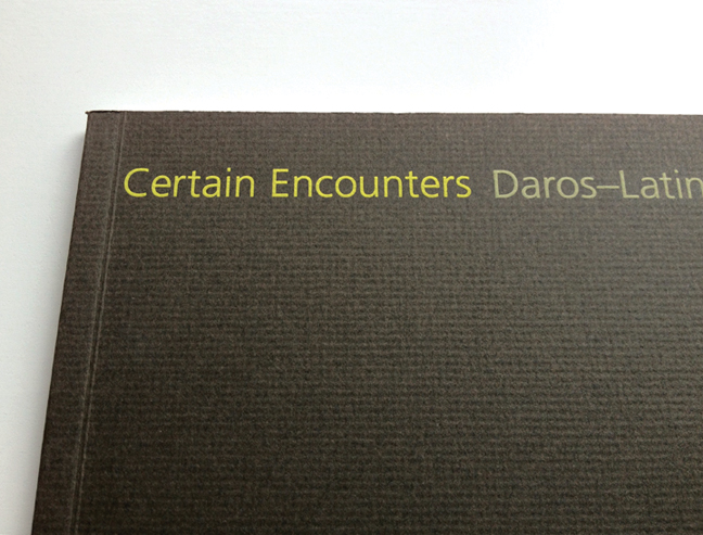 Certain Encounters: Daros-Latin America Collection catalogue · Textured Olive paper with neon engraving (detail)
