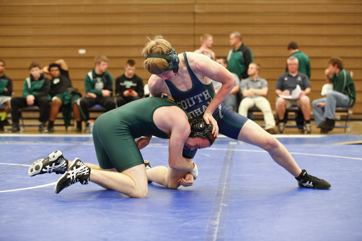 South Oldham's Max Knabel duel's Trinity High School's Jacob Miles in the 145-pound weight class. Miles went on to win the match by pin.