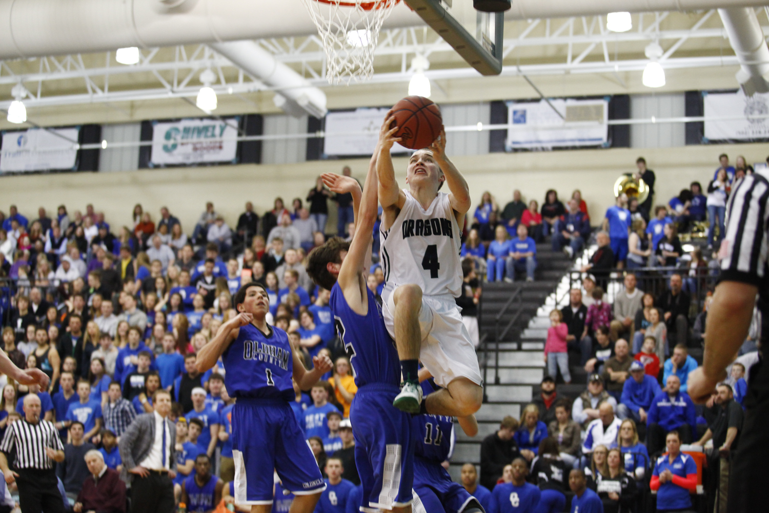 South Oldham guard Michael Griffin takes a shot during the Colonels 74-67 win over the Dragons in the final game of the District 29 Basketball Tournament in Goshen. 