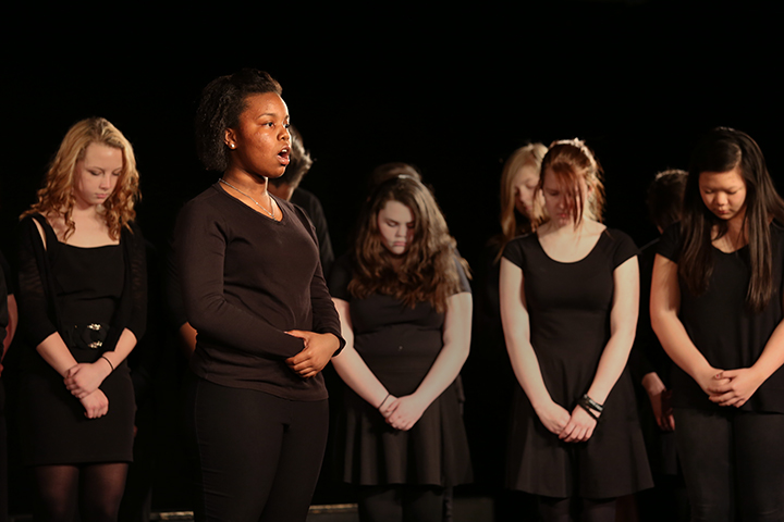 Anastasia Chapman sings with the Noe Middle School Chorus as part of the Anne Frank: Bearing Witness project. The project introduced middle school students to the Diary of Anne Frank and asked them to reflect and respond to what they read using performance art.