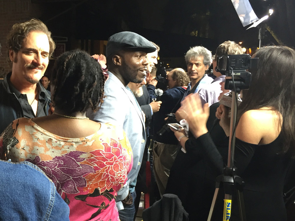 Kim Coates and Reno Wilson being interviewed