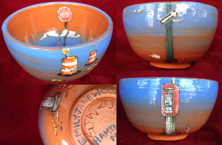 Bowl, with street-signs and a phone booth