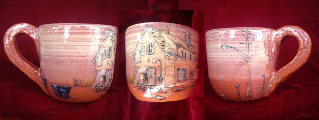 Mug, with a weird pink house on Caniff near Klinger (as seen from the alley)