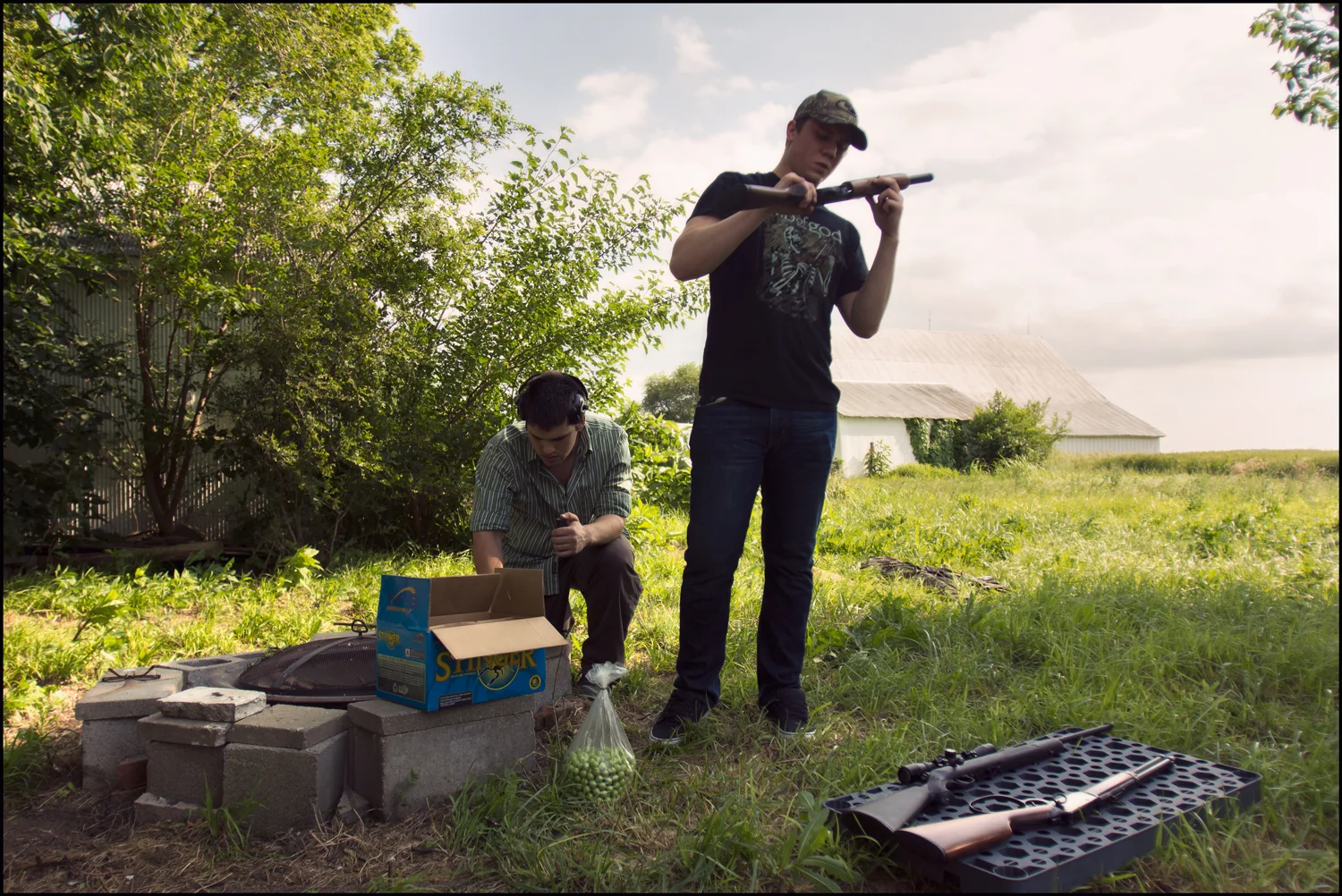 While working in Missouri, two hotel employees invite me to go out shooting on a farm a few miles from the city of Excelsior Springs. Logan and Matt taught me how to shoot and the evening ended with beers & ribs at a nearby rib-shack. If you're going to learn to shoot, why wouldn't you do it on a farm in Missouri?