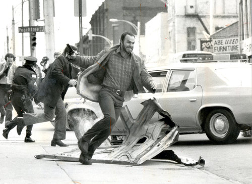Burt Reynolds in Sharky's Machine, not far from the downtown car rental locations.