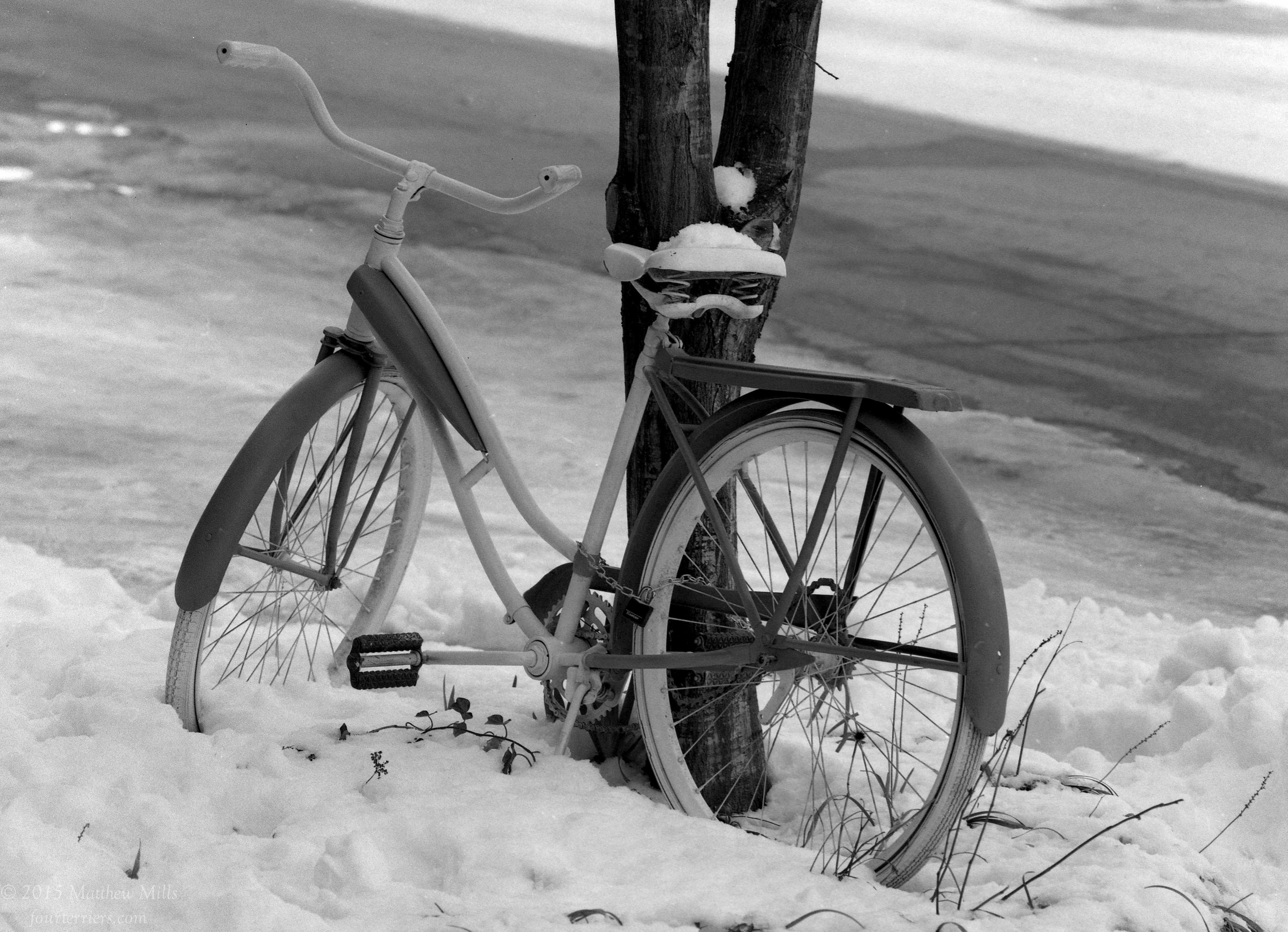 Bike in Snow on a Warm Spring Day
