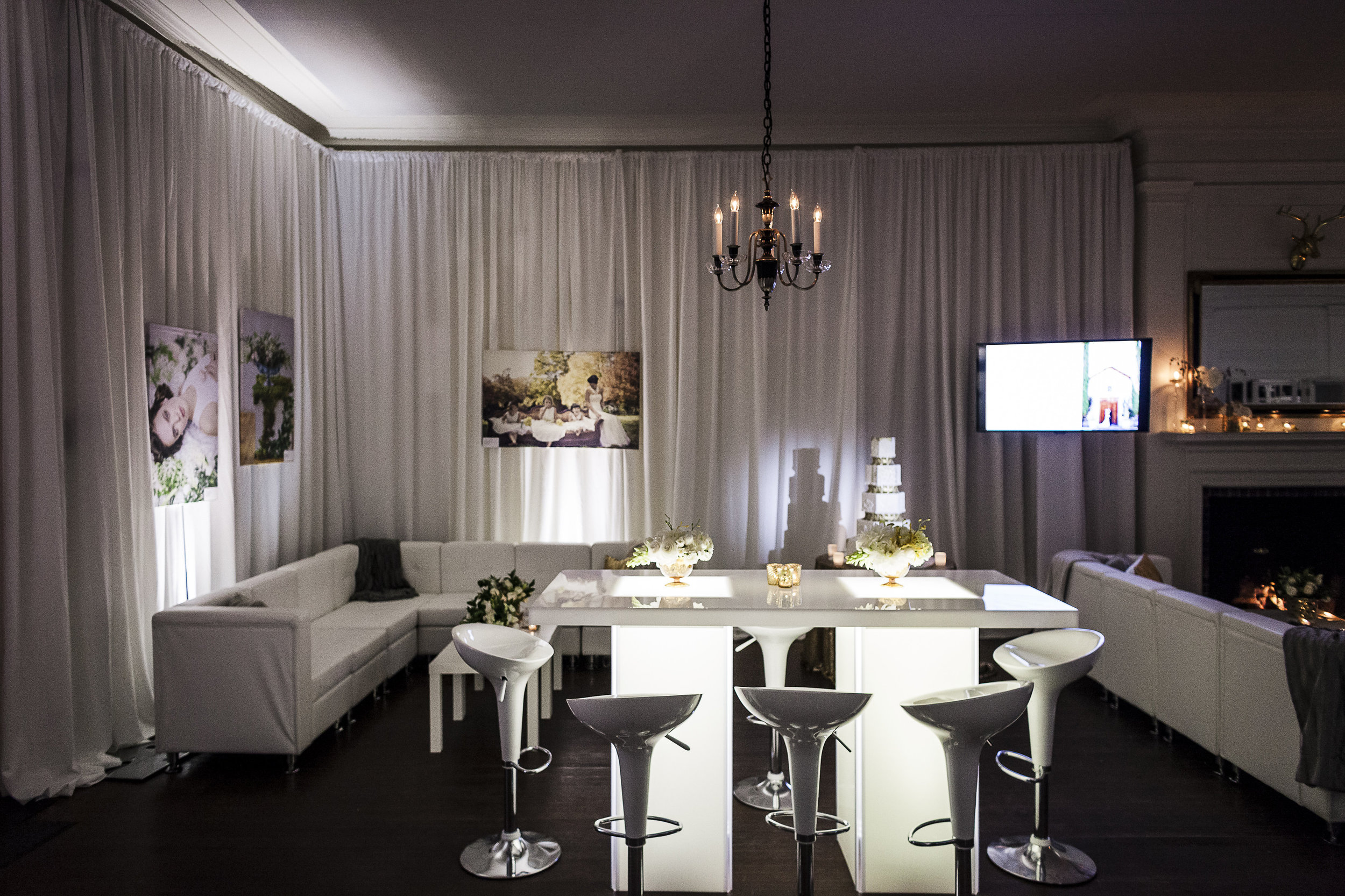I swear Shindig Lighting really knows how to bring a party to the next level - lounge, communal tables, pipe and drape, and of course lighting completely transforms the space.