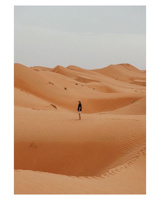 We dig with our toes and plant our legs knee-deep into the sand. The heat from the day radiates upward through the dunes and surrounds our feet and calves, soothing our weary limbs. 
The sandstorms have settled, the scorpions are yet to appear, and t